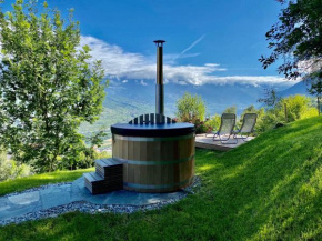 Eco Lodge with Jacuzzi and View in the Swiss Alps Grône